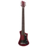 Hofner Shorty electric guitar; Finish: metallic red; Fretboard: rosewood; Frets: good; Electrics: