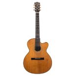 Hofner six string acoustic guitar with wide neck and rounded cutaway body; Finish: natural,