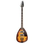 1960s Kawai hollow body teardrop bass guitar; Finish: sunburst, heavy lacquer cracks; Fretboard: