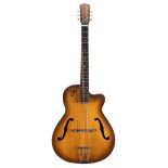 1963 Eko 100 hollow body guitar; Finish: tobacco burst, various imperfections including minor