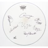 Mark Knopfler - an autographed used Remo snare drum skin, signed by Mark Knopfler and the seven