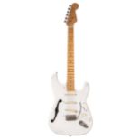 Three Strat style electric guitars including a Tanglewood Electric Elf shortscale guitar and one