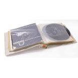 The Beatles - ring binder containing a collection of nineteen Beatles 45rpm vinyl singles, to