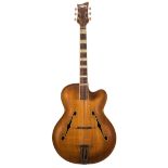 1950s Ambassador acoustic archtop guitar; Finish: burnt umber, minor lacquer checking throughout,