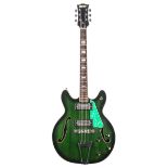 Early 1970s Univox Coily hollow body electric guitar, made in Japan, ser. no. 2xxxxx9; Finish: green