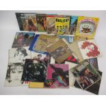 Approximately twenty-seven vinyl LP records to include The Beatles various, Ry Cooder, Elvis