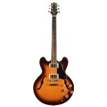 Artisan semi hollow body electric guitar, sunburst finish, soft bag; together with a Shine Tele