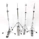 Four hi-hat stands, including a vintage Ludwig stand with Spur-Lock heel, other examples include DW,