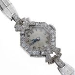 Platinum and diamond 1920s lady's cocktail watch, octagonal engine turned silvered dial with