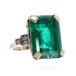 Large doublet emerald and diamond ring with diamond set shoulders, the emerald measuring 20mm x