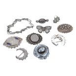 Seven assorted Victorian silver brooches; also a marcasite set butterfly brooch, bracelet and