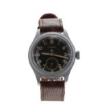 Timor WWII Military issue stainless steel gentleman's wristwatch, circular black dial with