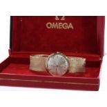 Omega 9ct mid size gentleman's bracelet watch, London 1963, no. 19840xxx, circular silvered dial