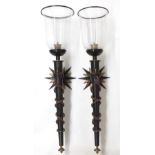 Large pair of metal torch wall lights on starburst wall mounts, with applied rope twist metal detail