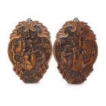 Pair of Chinese hardwood relief carved figural wall plaques, 13" high (2)