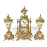 French style gilt metal mantel clock garniture, the panels decorated with figural scenes, 16" high