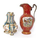 Replica porcelain and gilt metal mounted crackle glaze ewer on a red ground with painted bird panel,