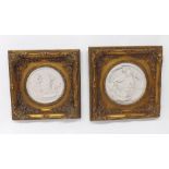 Pair of gilt framed faux marble circular plaques, each with Classical figural scenes, 12" (2)