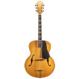 Antonio Tsai acoustic archtop guitar; Finish: natural, heavy buckle scrapes to the back;