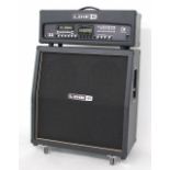Line 6 Vetta II HD guitar amplifier, made in China; together with a Line 6 4 x 12 angled speaker