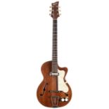 Antoria small bodied hollow body electric guitar; Finish: walnut, lacquer checking, hairline