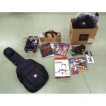 Good selection of mainly guitar and some other stringed instrument accessories including gig bags,