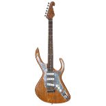 Frazer eccentric super-Strat style solid body electric guitar; Finish: natural; Fretboard: rosewood;