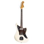 Mid 1990s Fender Jaguar electric guitar, made in Japan, ser. no. T07xxx4; Finish: Olympic white;