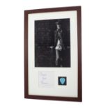 Ronnie Wood - signed black and white photograph, a signed note and a 'Ronnie Wood' guitar pick,