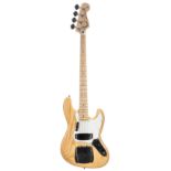 Custom build jazz bass guitar, comprising a natural finish body (minor blemishes), a Fender licensed