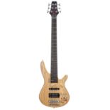 Shine six string bass guitar; Finish: natural; Fretboard: rosewood; Frets: good; Electrics: working;