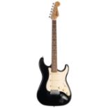 Squier by Fender Strat electric guitar, black finish, hard case; together with a Marshall MG101C