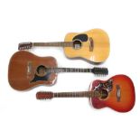 Three twelve string acoustic guitars all in need of attention including a Landola, E-Ros and