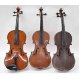 Two old full size and a three-quarter size violin (3)