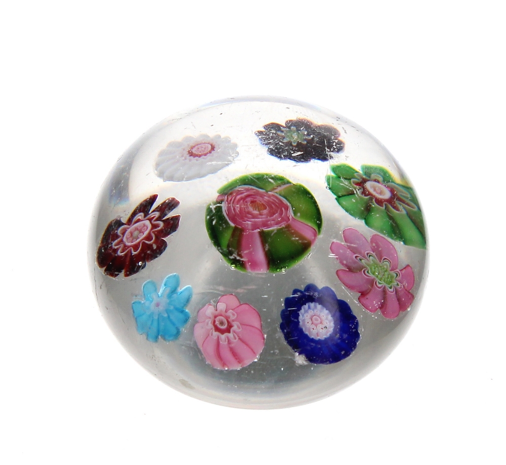 Miniature glass and millefiori paperweight probably Clichy, with multicoloured short canes around