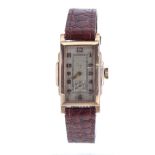 Art Deco 9ct rectangular stepped case gentleman's wristwatch, London 1932, rectangular silvered dial