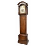 Oak three train longcase clock, the 13" brass arched dial with Tempus Fugit engraved boss to the