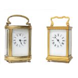 French oval carriage clock timepiece, within a brass case, 6.25" high; also another French