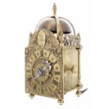 Fine and rare miniature hook and spike brass verge lantern clock, the 3" brass arched dial signed