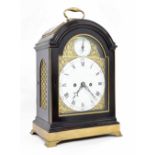 Good English ebonised and ormolu mounted double fusee verge bracket clock, the 7" brass arched