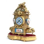 French porcelain and gilt metal mounted two train mantel clock striking on a bell, the 3.5"
