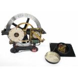 Gents programmer slave movement, 13.5" high overall; also a Synchronome slave mechanism in a black