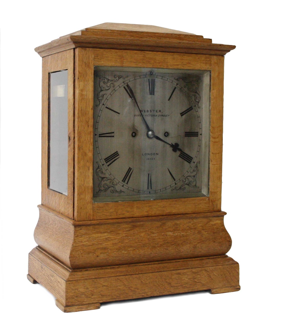 English oak double fusee library clock, the 8" square silvered dial and back plate signed Webster,