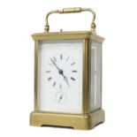 French repeater carriage clock with alarm, striking on a bell, within a corniche brass case, 6.5"