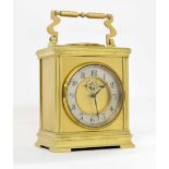 French ormolu travelling clock, the 3.25" silvered chapter ring enclosing a recessed centre with