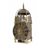 Antique brass hoop and spike lantern clock in need of restoration and with later parts, the 6.5"