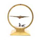 Jeffersen "Golden House" mystery clock by Jeffersen Electric company, with synchronous movement