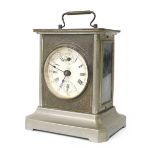 Musical carriage type clock, fitted with a cylinder and comb to the base, the 2.75" white dial