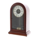 Bulle electric clock with in a round top wooden inlaid case, the 5" silvered dial with