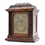 German double fusee bracket clock striking on a large gong, the rectangular gilt foliate engraved